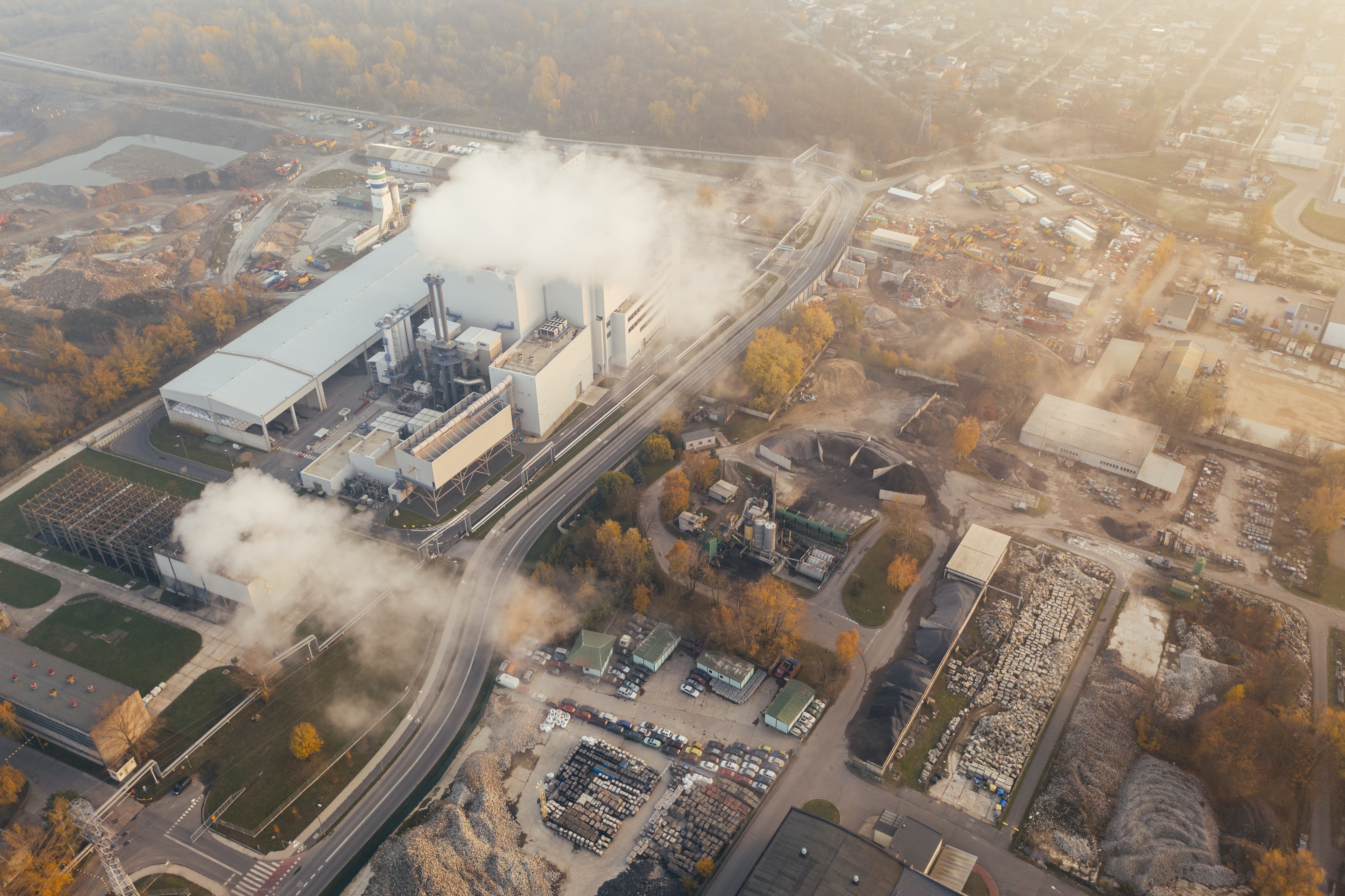 i18n: An Aerial View Of Billowing Fumes From Factories